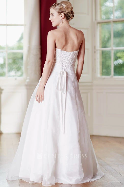 A-Line Floor-Length Appliqued Strapless Sleeveless Satin Wedding Dress With Lace-Up Back And Side Draping