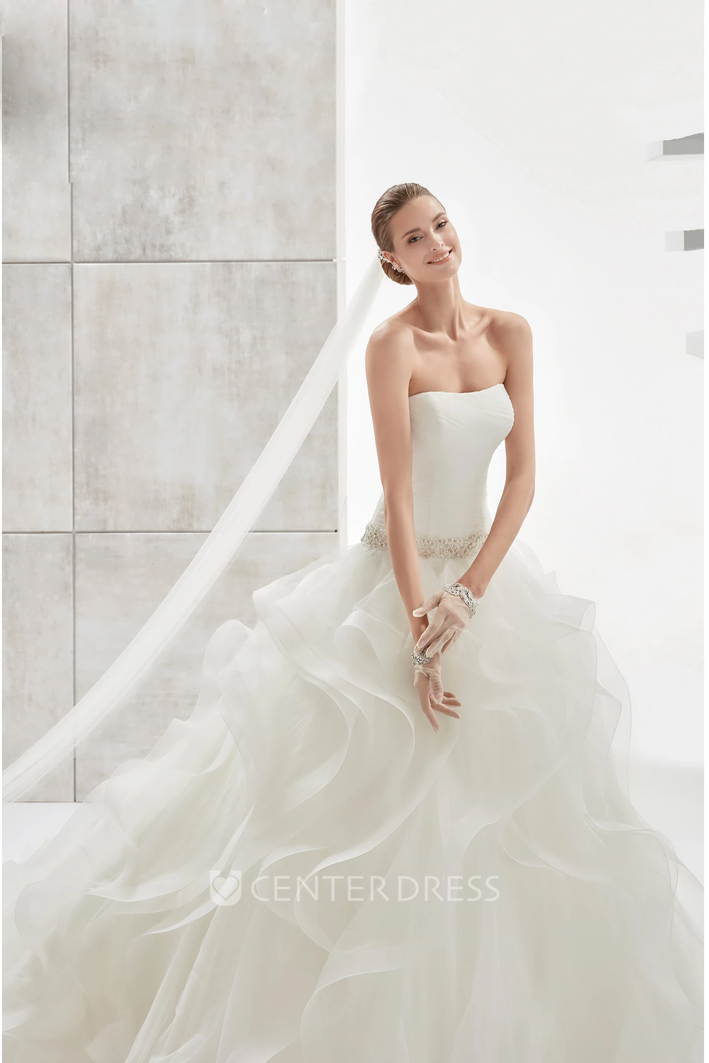 Strapless Pleating Wedding Dress with Cascading Ruffles and Beaded Details