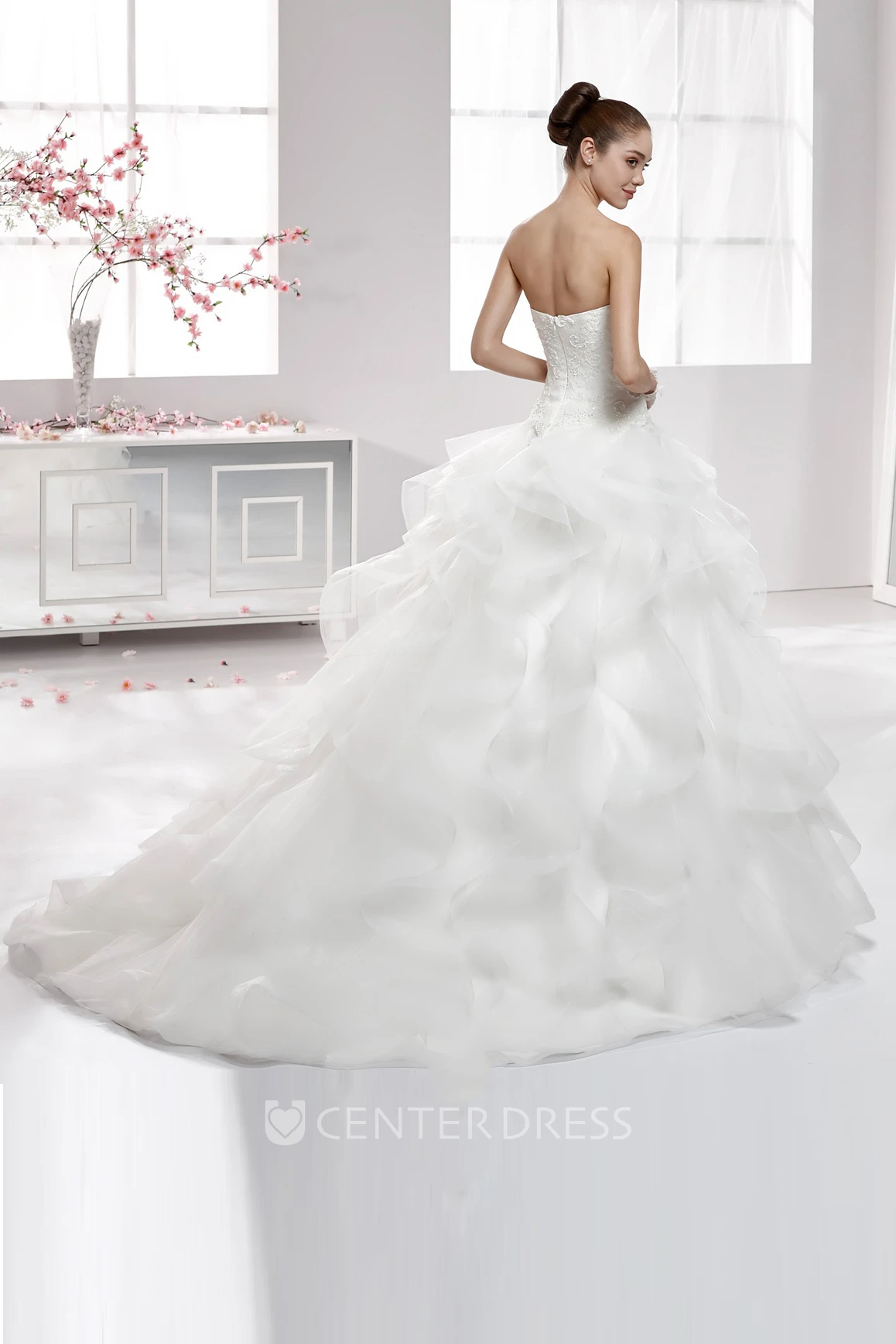 Sweetheart A-Line Wedding Gown With Cascading Ruffles and Lace Appliqued Corset