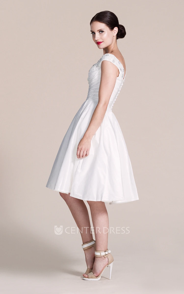 Cap-sleeved V-neck A-line Dress With Pleats and Beadings