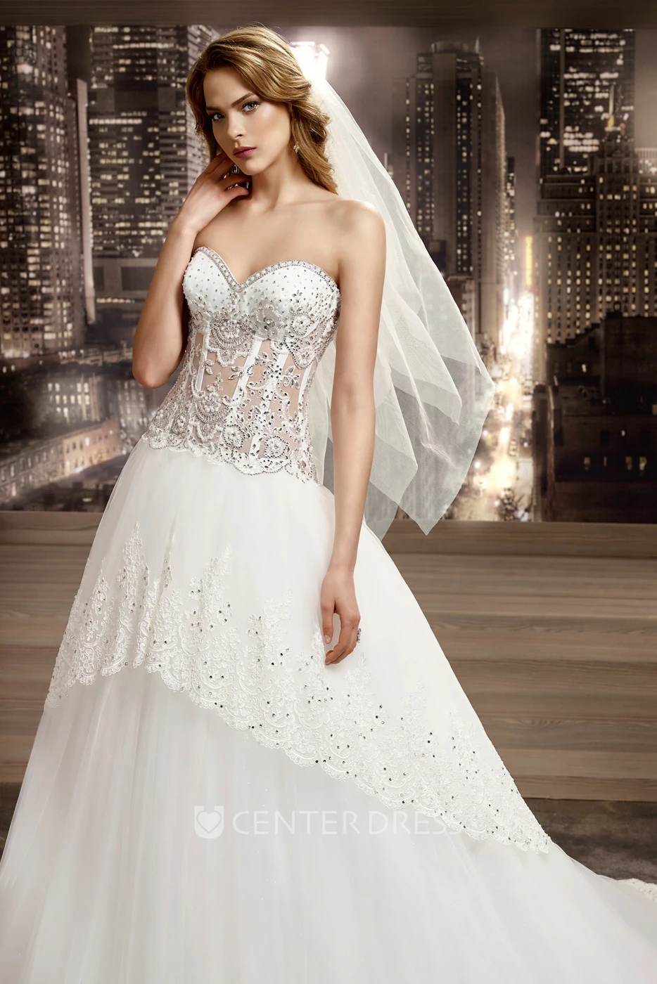 Sweetheart Illusion Beaded A-Line Bridal Gown With Peplum And Brush Train