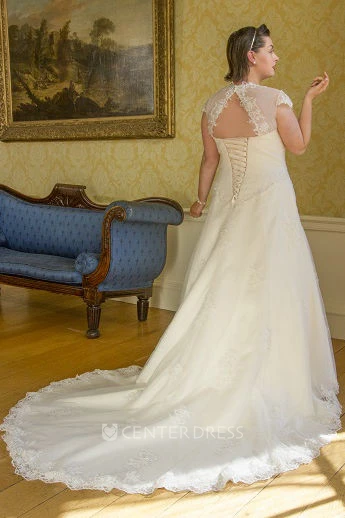 Cap Sleeve Lace Bridal Gown With Lace Up And Keyhole