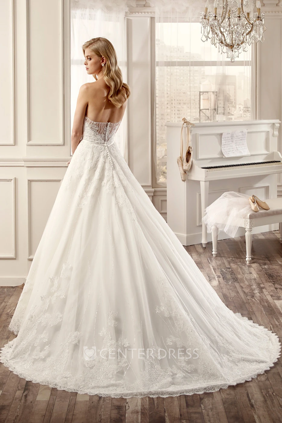 Strapless A-Line Lace Wedding Dress With Appliques And Brush Train