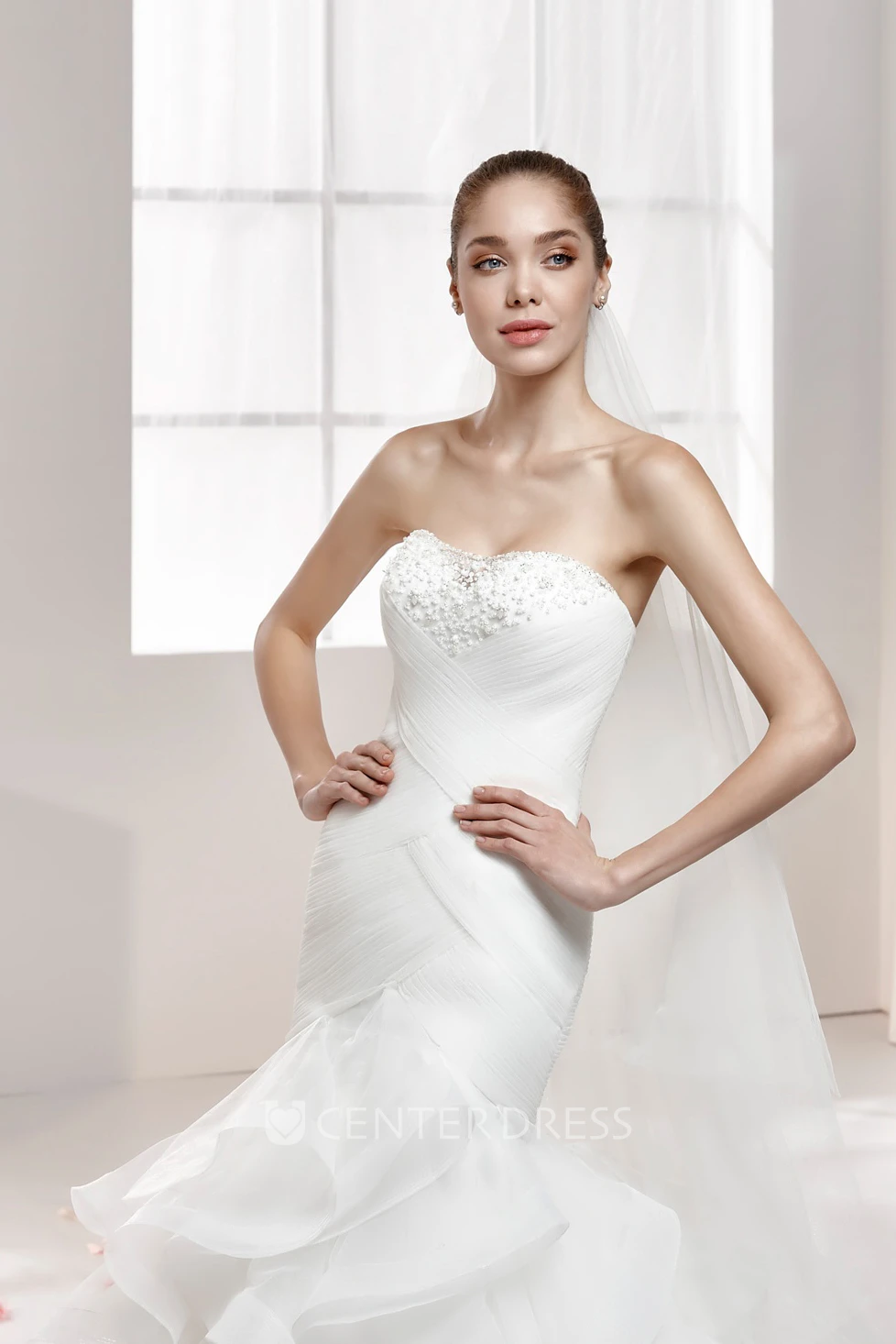 Strapless Ruffled Mermaid Wedding Gown with Beaded Bust and Crisscross Waist