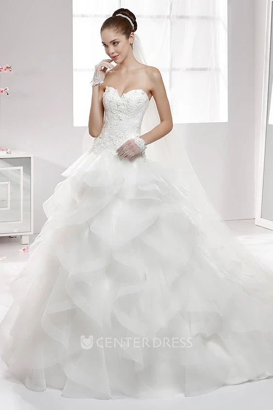 Sweetheart A-Line Wedding Gown With Cascading Ruffles and Lace Appliqued Corset