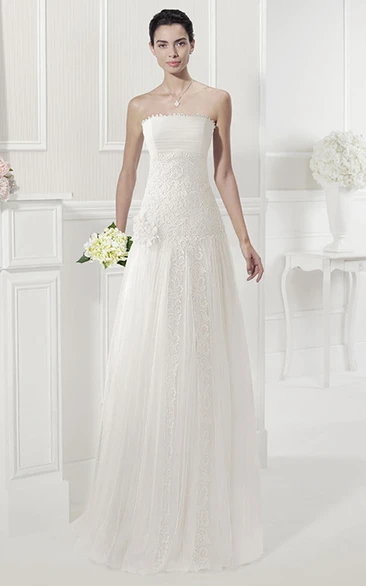 Strapless Drop Waist Tulle Gown With Appliques And Flower