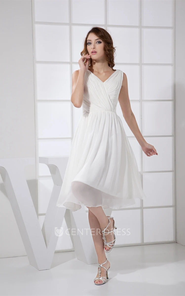 Sleeveless Knee-Length Low-V-Back Pleats and Dress With Ruching