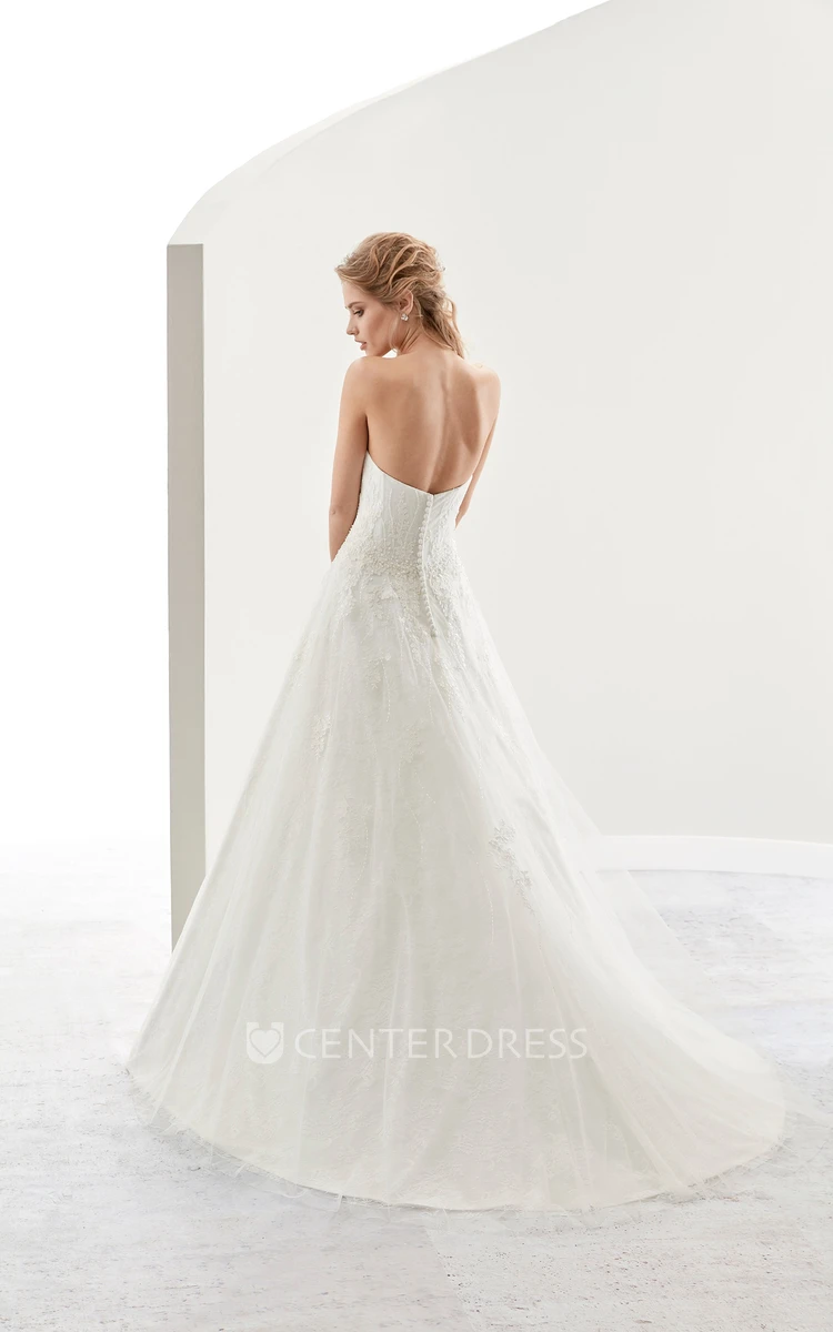 Strapless A-Line Lace Bridal Gown With Fine Appliques And Brush Train