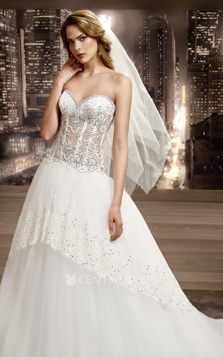 Sweetheart Illusion Beaded A-Line Bridal Gown With Peplum And Brush Train