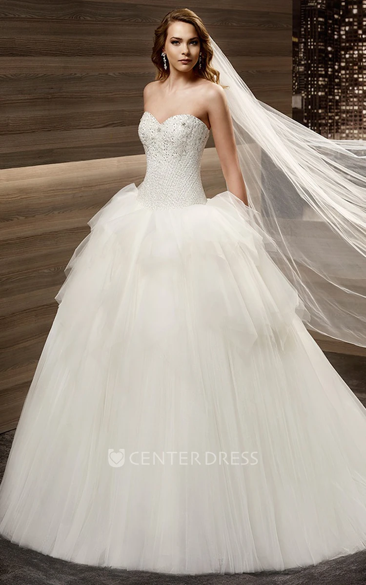 Sweetheart Beaded Wedding Gown with Pleated Corset and Ruffled Skirt