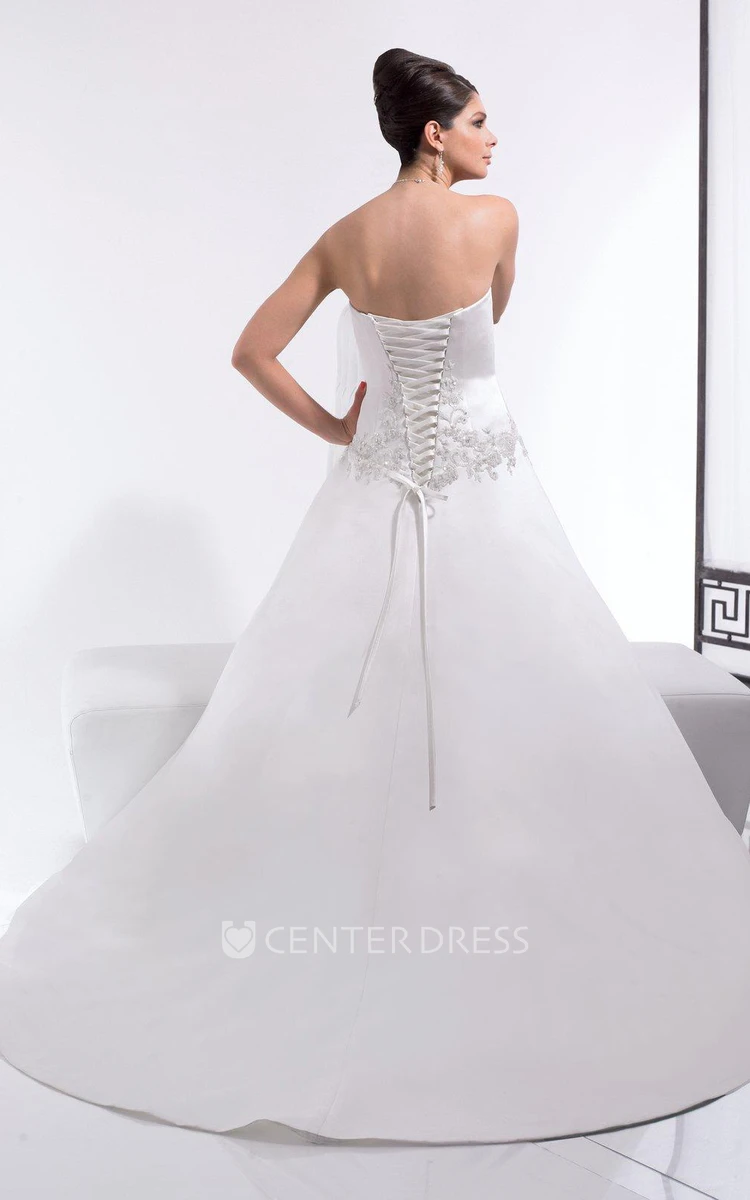 A-Line Appliqued Long Sleeveless Strapless Satin Wedding Dress With Draping And Corset Back