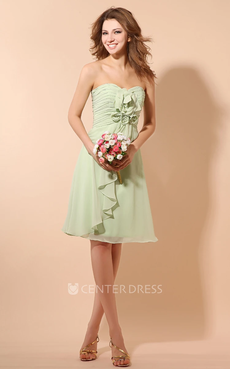 Ethereal Soft Flowing Fabric Short Dress With Ruching And Flower