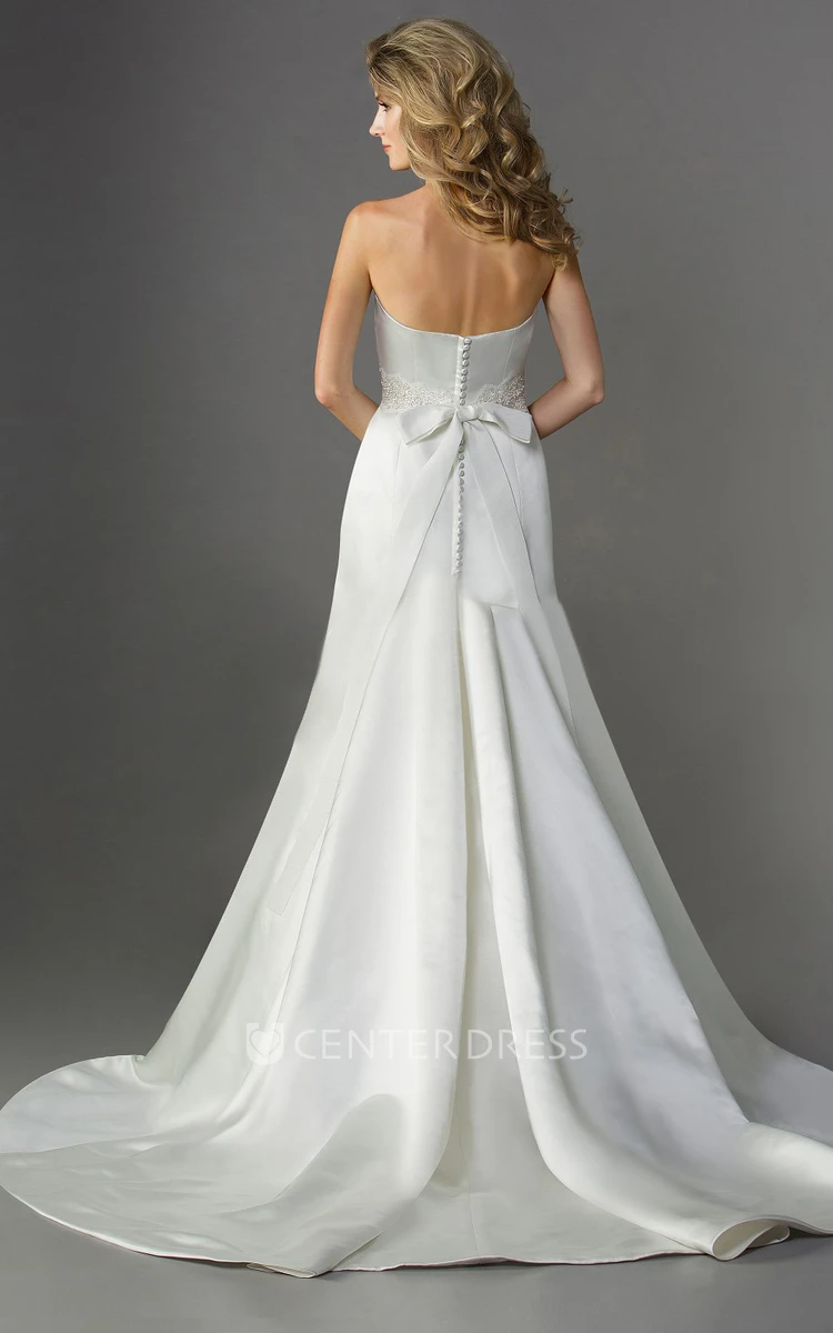 Strapless Satin Trumpet Gown With Beadings And Bow Tie